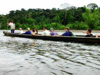 Travelling by dugout canoe, Ecuador
